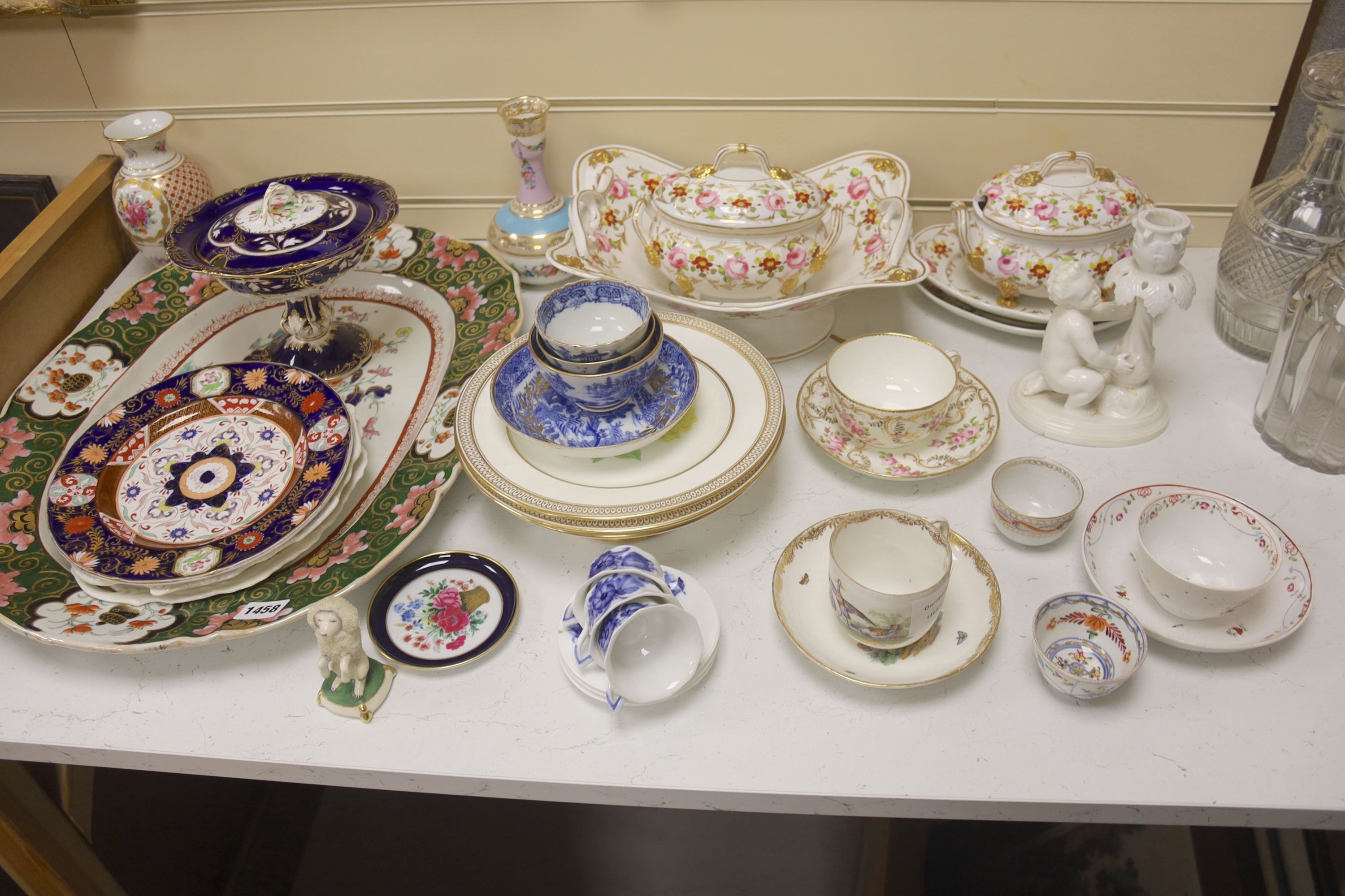 A collection of decorative ceramics to include cabinet cups and saucers, a delft casket, vases, etc.